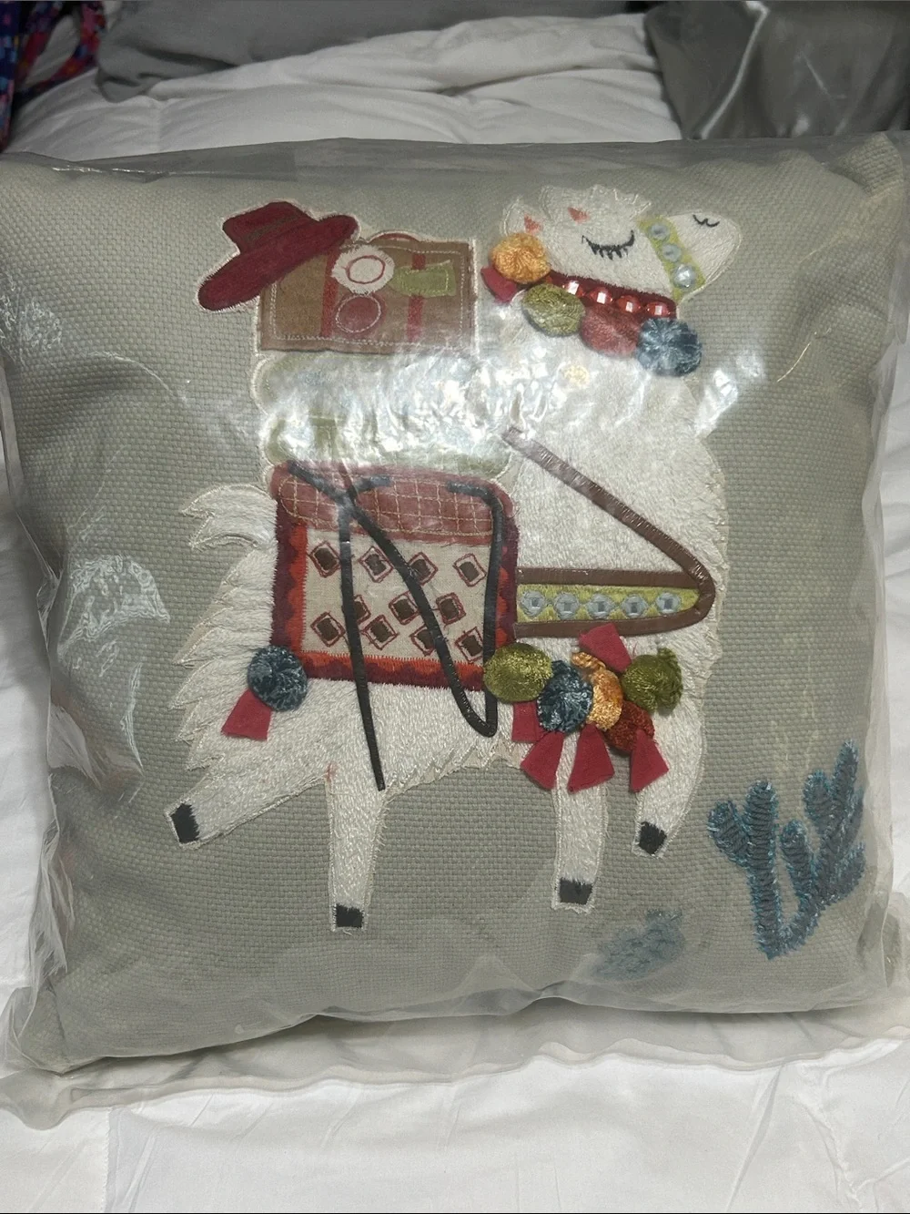 Pier 1 light green Throw Pillow with Embroidered Llama and Multicolor Accents